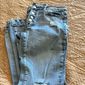 Bailey Made jean’s distressed knees and bottom hem